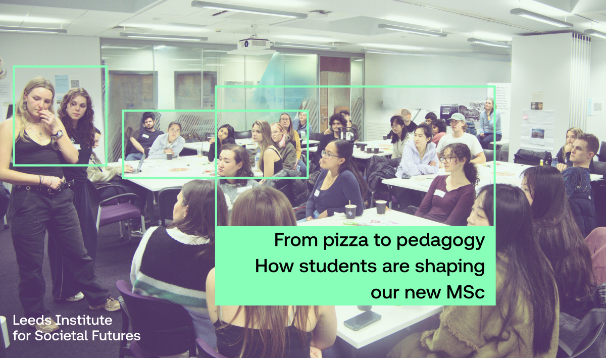 Picture of a class of students looking at a board - title says from pizza to pedagogy - how students are shaping our new MSc