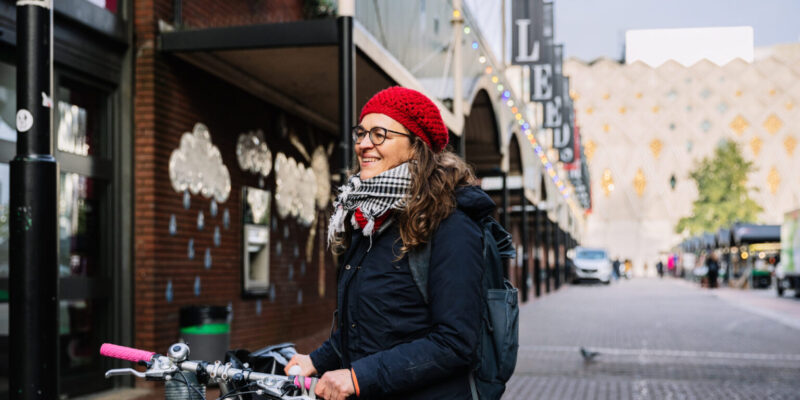 Prof Sara Gonzalez holding her bike