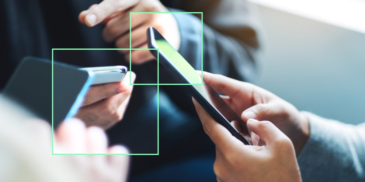 People's hands using smart phones