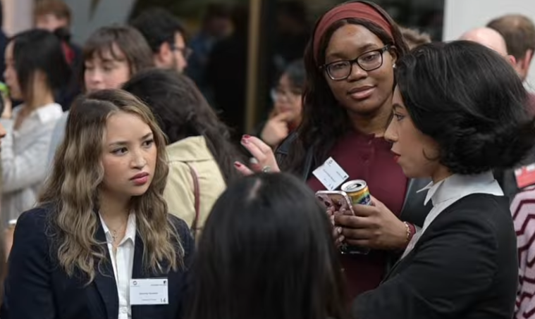 Female barrister talking to women